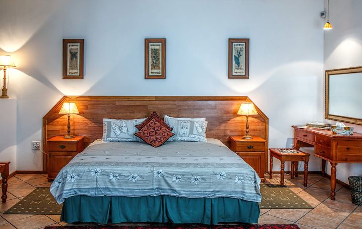 hình ảnh phòng ngủ với đầu giường bằng gỗ