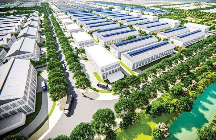 hình ảnh một khu công nghiệp nhìn từ trên cao với nhà xưởng san sát màu trắng, xen kẽ đường nội bộ, cây xanh