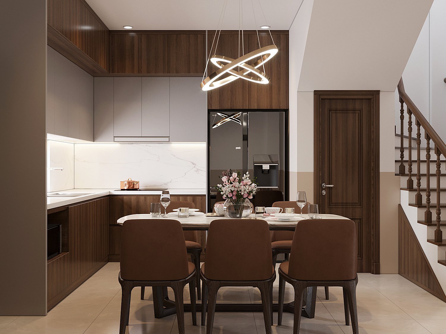 Ánh sáng cho phòng bếp được thiết kế vừa đủ, đảm bảo sự tiện lợi trong sinh hoạt hàng ngày. Đèn thả trần hiện đại giúp ấn định rõ khu vực ăn uống trong nhà phố 3 tầng.