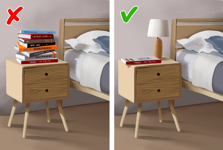 hình ảnh phòng ngủ với chồng sách đặt trên bàn cạnh đầu giường
