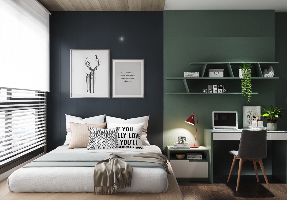 Phòng ngủ con trai lớn gây ấn tượng ngay từ cái nhìn đầu tiên bởi mảng tường sơn màu xanh ngọc và xanh than phân chia hai khu vực ngủ nghỉ, làm việc.