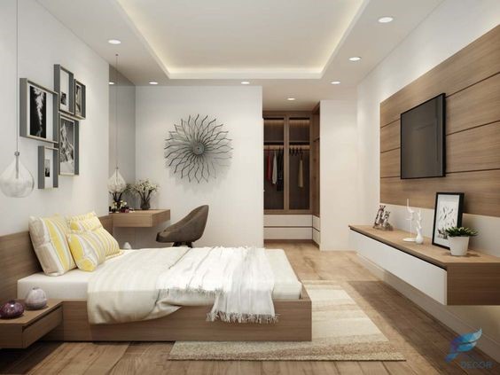 Không gian phòng ngủ của vợ chồng gia chủ được bài trí với bảng màu trung tính nhẹ nhàng, tạo cảm giác thư giãn tối đa cho người dùng.