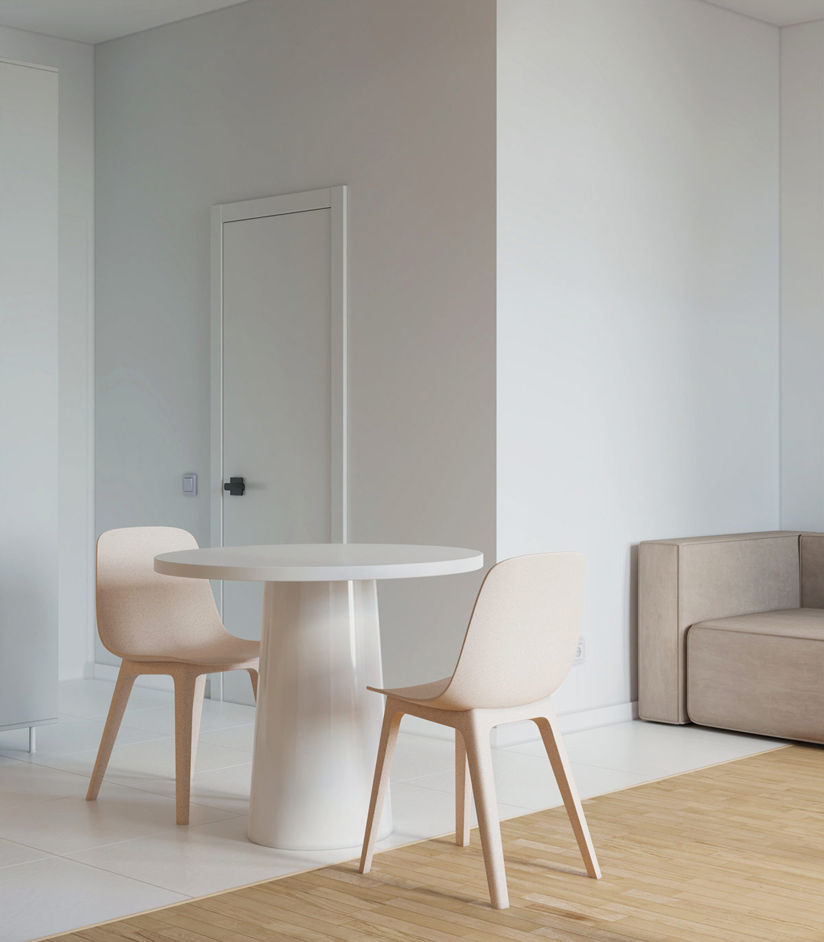 Bộ bàn ăn nhỏ được đặt chồng lên trên cả gạch trắng từ nhà bếp và sàn gỗ thông chắc chắn của phòng khách, tạo sự phân tách tương đối giữa các khu vực chức năng.