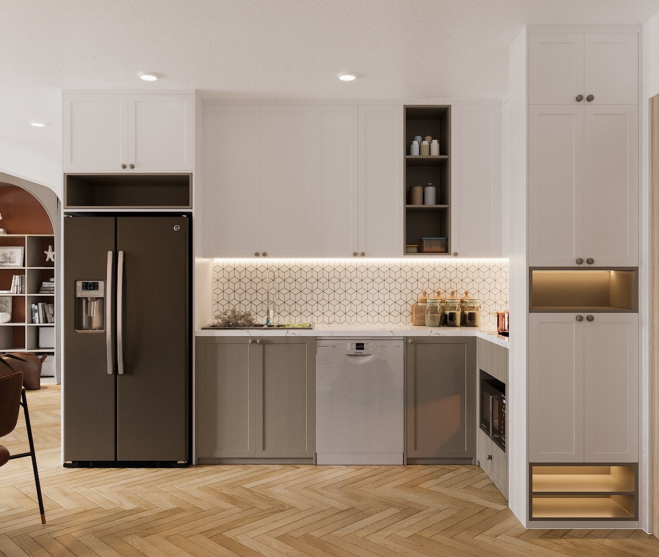 Hệ tủ bếp trên tông trắng tinh khôi như "tàng hình", tạo cảm giác thoáng rộng hơn. Tường chắn bếp ốp gạch men họa tiết hình học trang nhã, hiện đại.