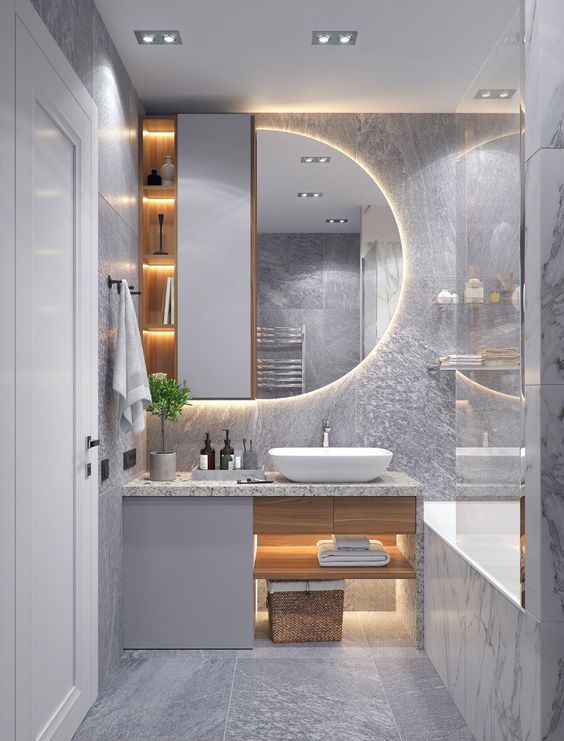 Phòng vệ sinh trong nhà ống 4 tầng được thiết kế với bảng màu xám trắng sang trọng, tạo cảm giác sạch sẽ và thoáng rộng hơn.