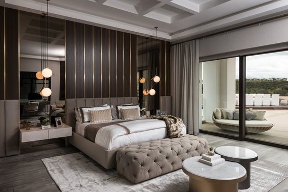 Phòng ngủ master sử dụng nội thất cao cấp tông màu trầm trung tính sang trọng.