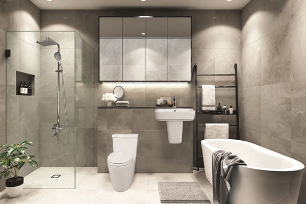 Phòng tắm trong nhà phố 3 tầng với tường và sàn ốp gạch men tông màu xám trắng sang trọng, tạo cảm giác thư giãn như ở spa.