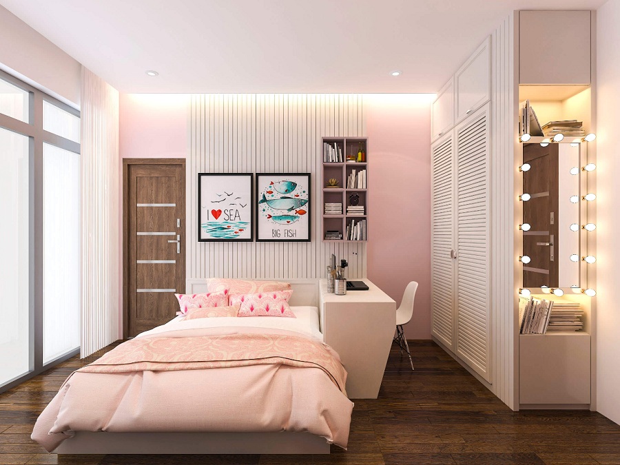Phòng ngủ tông màu hồng phấn nhẹ nhàng, nữ tính dành cho cô con gái út. Tủ quần áo cao kịch trần màu trắng như hòa lẫn vào không gian, tạo cảm giác thoáng rộng hơn.