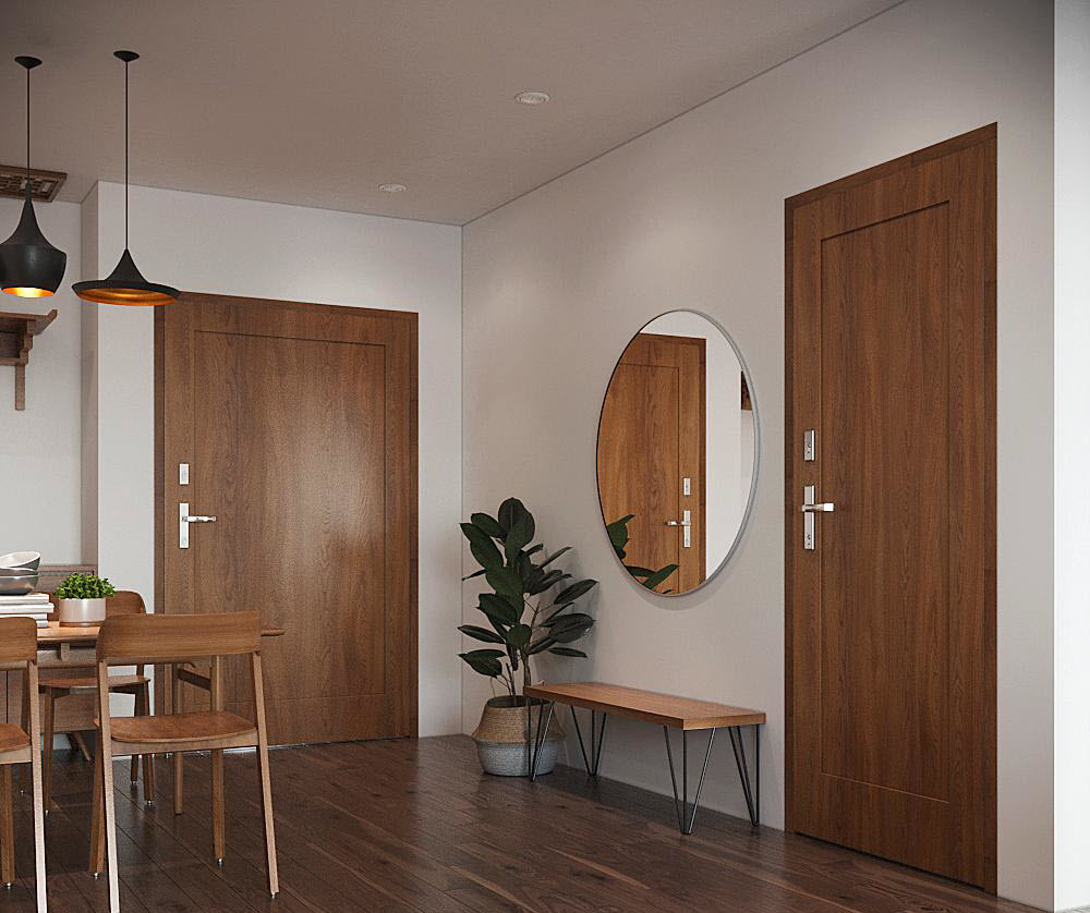 Lối vào căn hộ gọn xinh với gương tròn lớn gắn tường tạo cảm giác thoáng rộng hơn cho không gian ăn uống. Cùng với đó là băng ghế gỗ mộc mạc, chậu cảnh lớn xanh mát.