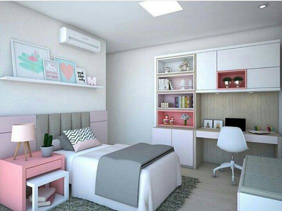 Phòng ngủ con gái được thiết kế và bài trí với tông màu hồng - xám - trắng nhẹ nhàng, nữ tính. Căn phòng tích hợp góc thư giãn với băng ghế dài êm ái.