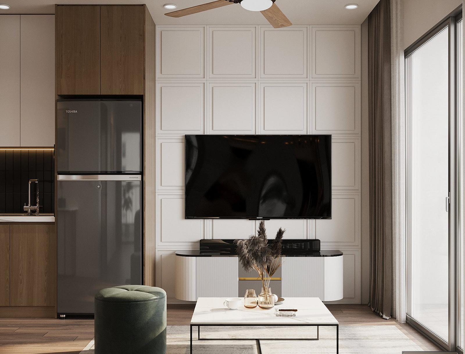 Không gian nấu nướng được thiết kế liền kề, liên thông với phòng khách nhằm tận dụng tối đa ánh sáng tự nhiên từ ban công, đồng thời tăng tính kết nối giữa các thành viên