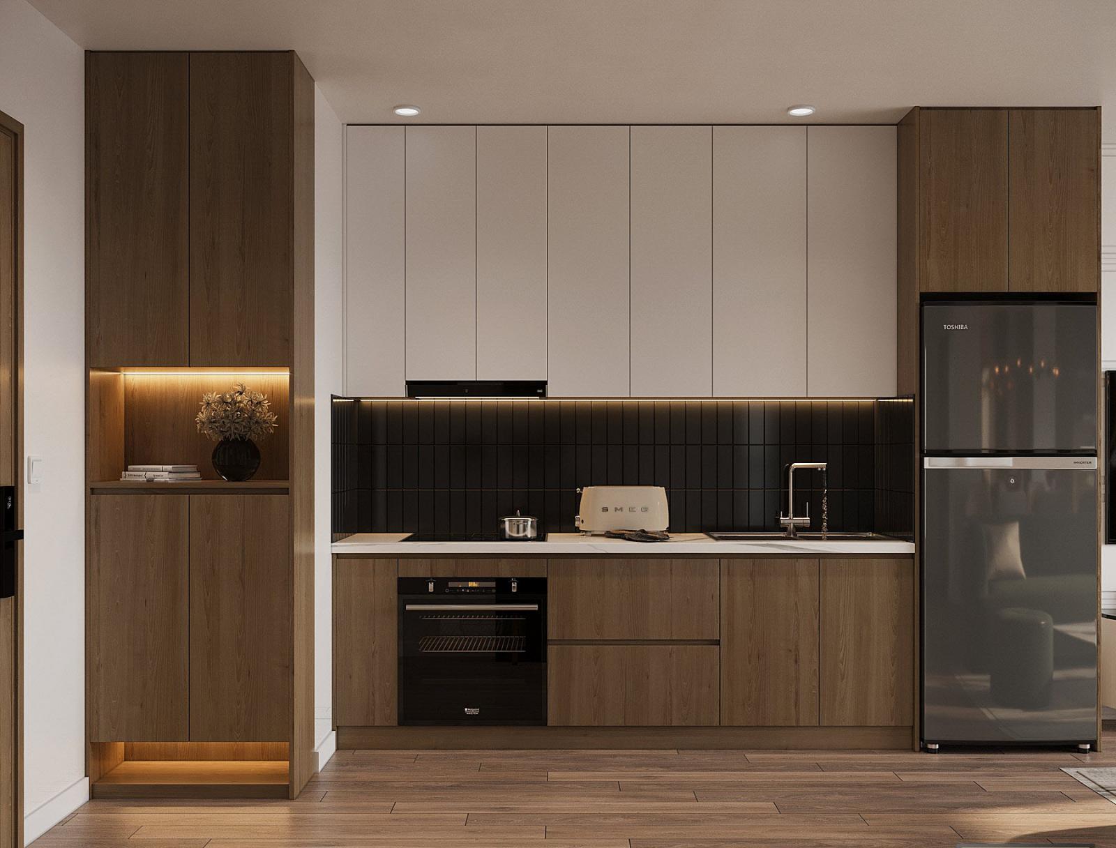 Không gian bếp được thiết kế gọn đẹp và đầy đủ tiện ích hiện đại trên một mảng tường.