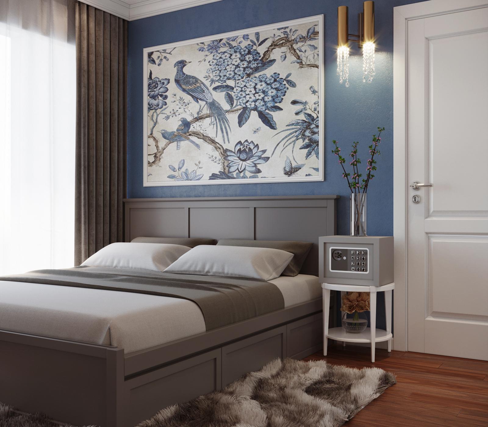 Trong phòng ngủ master của căn hộ 80m2, tường đầu giường màu xanh lam kết hợp cùng tác phẩm nghệ thuật tạo điểm nhấn sinh động, mát mắt và nổi bật hẳn so với phần còn lại của căn phòng màu trung tính chủ đạo.