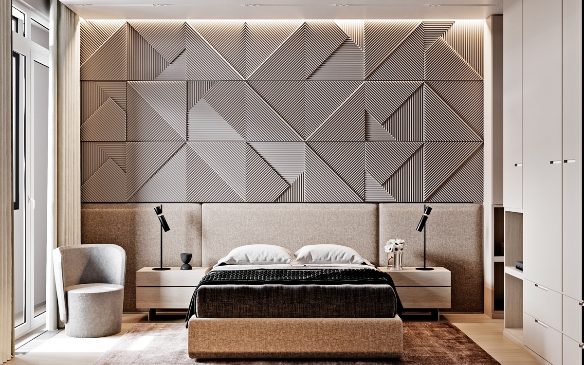Gạch ốp tạo hiệu ứng ấn tượng cho đầu giường. Dải đèn LED làm nổi bật kết cấu tường, chiều sâu không gian. Đầu giường bọc nệm tinh gọn, vừa vặn với chiều rộng của căn phòng.