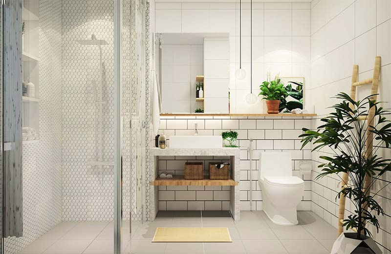 Phòng tắm - vệ sinh trong nhà ống 3 tầng được thiết kế đảm bảo cả về công thái học lẫn tính thẩm mỹ. Cây xanh trở thành điểm nhấn sinh động.