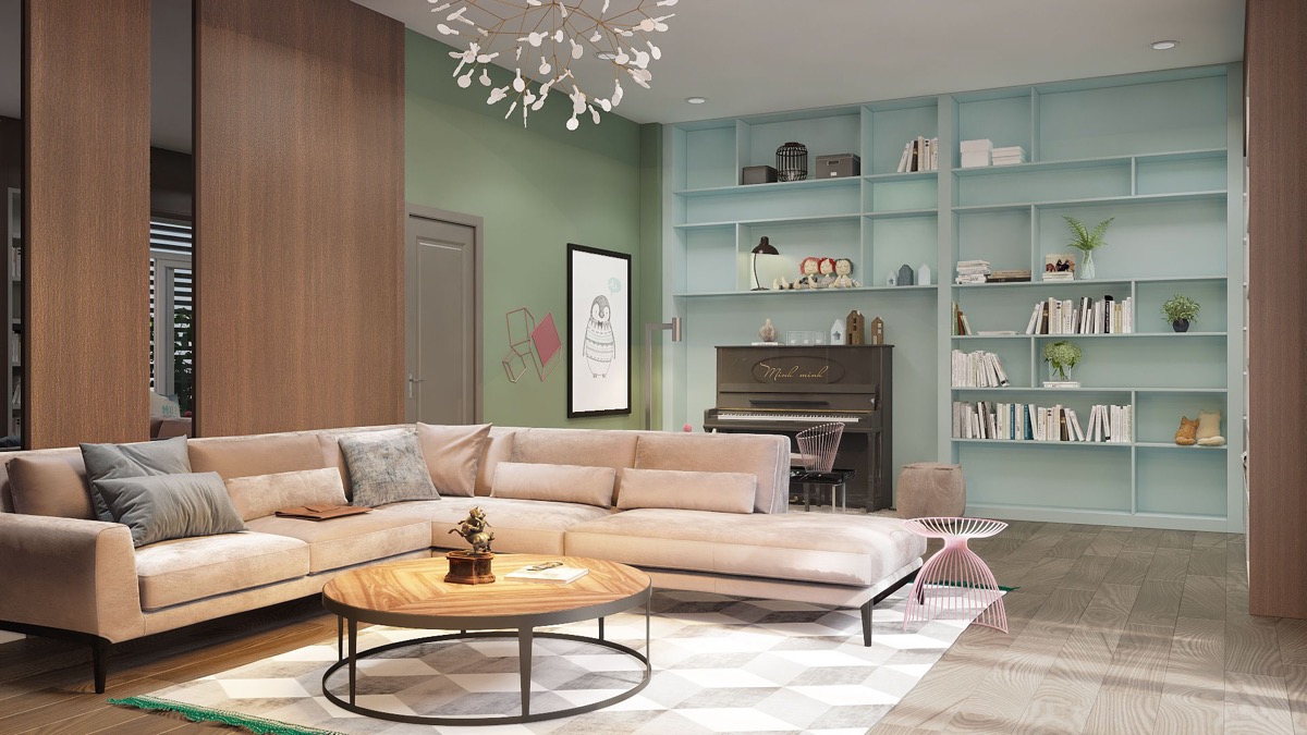 Sự kết hợp "siêu ngọt ngào" giữa tông màu hồng của ghế sofa và sắc xanh dương của giá kệ lưu trữ tạo vẻ quyến rũ cho không gian tiếp khách.