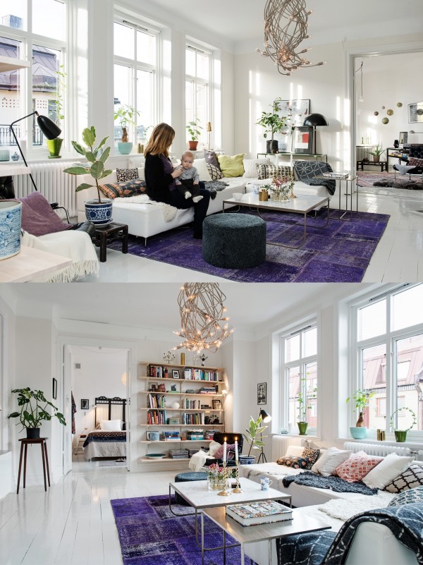 Một tấm thảm màu tím than mang đến sự nổi bật về màu sắc và kết cấu cho phòng khách màu trắng sáng này.