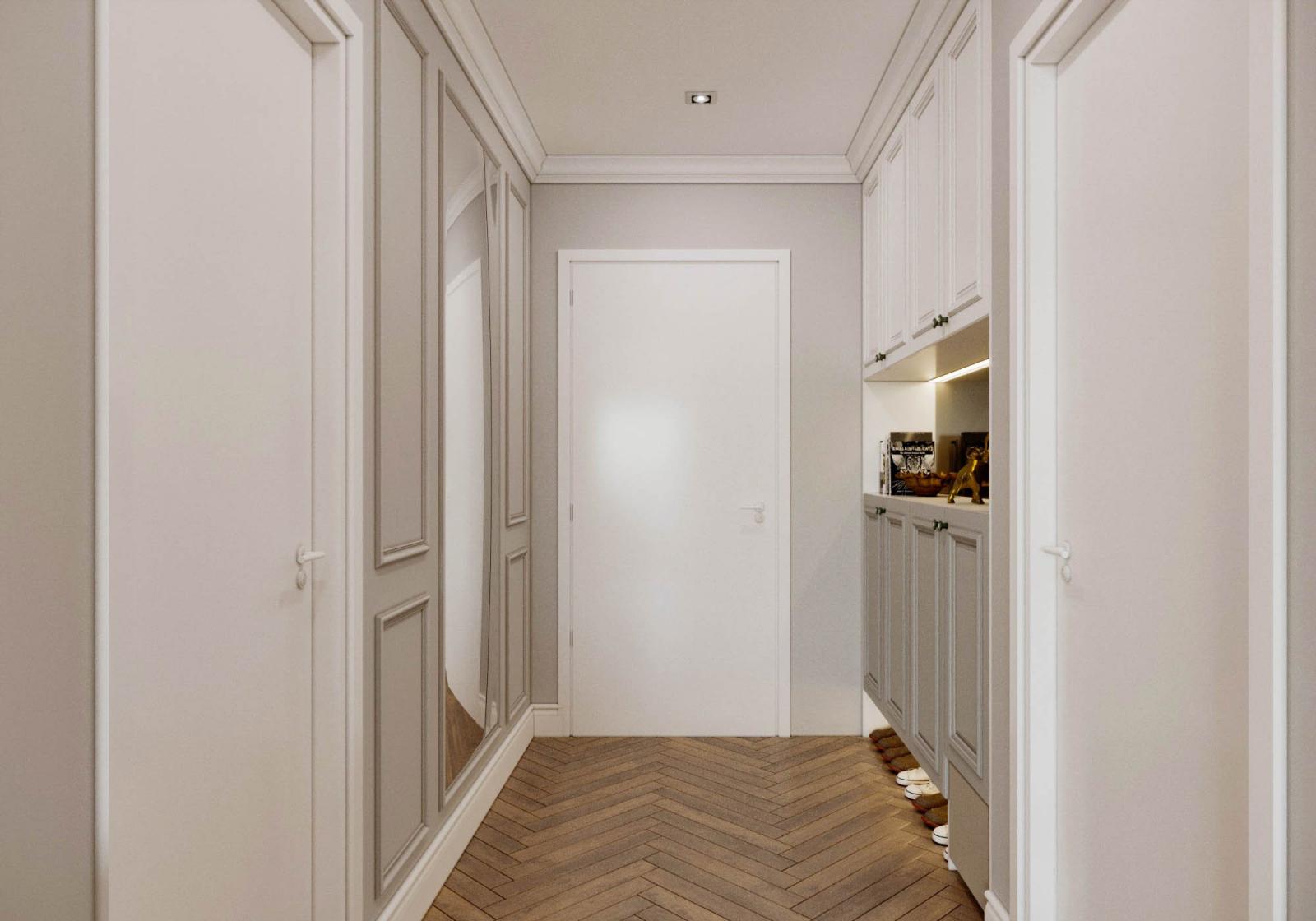 Lối vào căn hộ 93m2 với hệ tủ lưu trữ gọn đẹp. Bảng màu trắng xám nhẹ nhàng tạo cảm giác rộng thoáng hơn cho không gian.