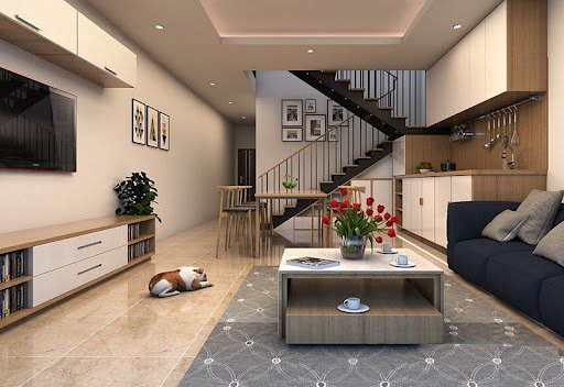 Phòng khách và khu bếp - ăn được thiết kế liên thông trên cùng một mặt sàn. Màu sắc nội thất và cách sử dụng phụ kiện trang trí giúp phân tách rõ từng khu vực chức năng. 