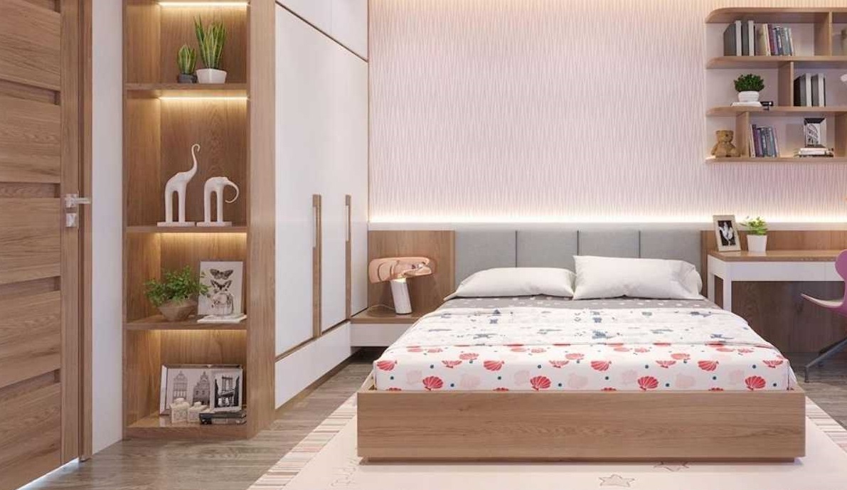 Không gian phòng ngủ dành cho cô con gái lớn với nội thất gỗ đồng bộ, thiết kế tủ quần áo âm tường gọn đẹp.