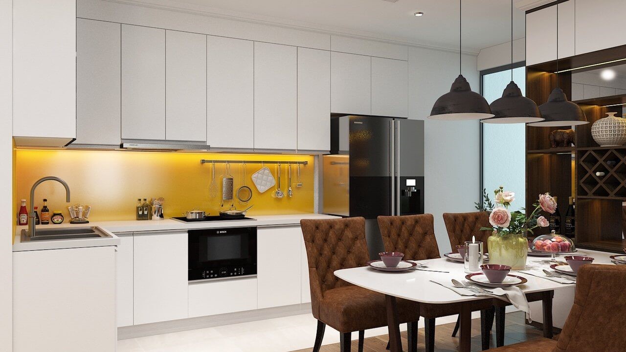 Không gian phòng ăn hiện đại, ấm cúng với điểm nhấn màu vàng chanh tươi sáng, tràn đầy năng lượng từ tường chắn bếp.
