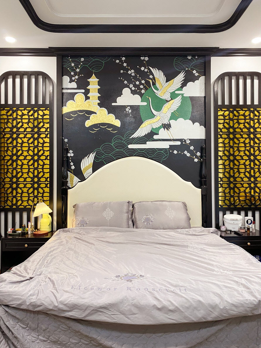 Mẫu thiết kế nội thất phòng ngủ dành cho những gia chủ chuộng phong cách Đông Dương sang trọng và ấm áp.