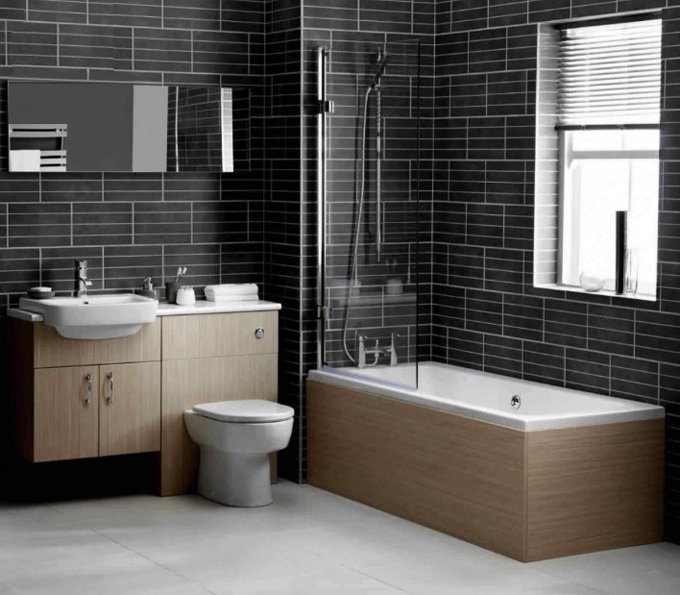 Mẫu phòng tắm ấn tượng cho biệt thự 2 tầng với gạch thẻ ốp tường màu đen cá tính, tạo chiều sâu cho không gian. 