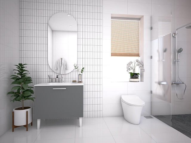 Phòng vệ sinh đủ đầy tiện ích hiện đại. Khu tắm được phân tách bởi vách kính trong suốt.
