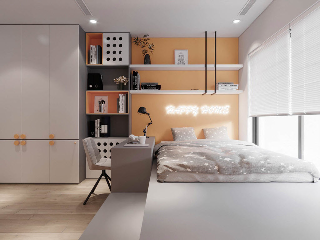 Phòng ngủ thứ hai trong căn hộ 130m2 sử dụng tông màu trắng sáng chủ đạo, với điểm nhấn màu cam ở tường đầu giường.