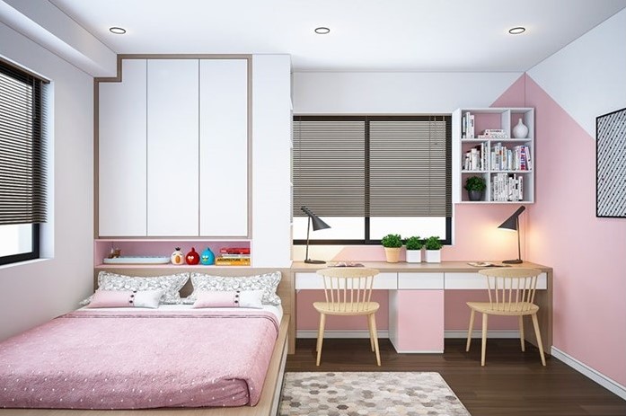 Phòng ngủ con gái bài trí nhẹ nhàng nữ tính với bảng màu hồng - trắng tinh tế.