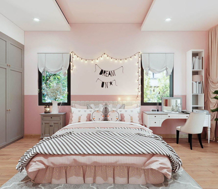 Phòng ngủ sắc hồng phấn xinh tươi dành cho cô con gái. Kiến trúc sư khéo léo phối kết bảng màu hồng - trắng chủ đạo kết hợp cùng những điểm nhấn màu xám tinh tế.
