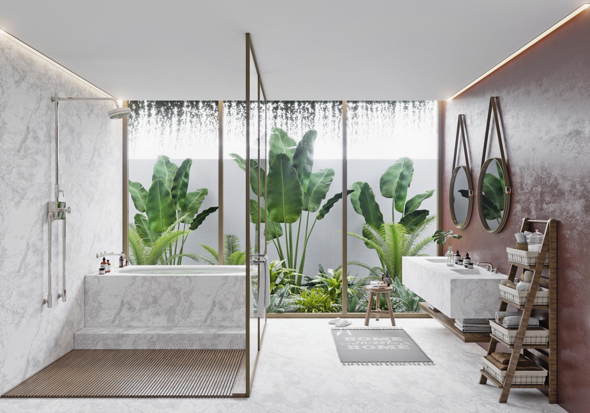 Phòng tắm phong cách nhiệt đới với sự kết hợp hoàn hảo giữa vòi sen và bồn tắm. Thảm thực vật xanh tốt tựa như một bức tranh trang trí.