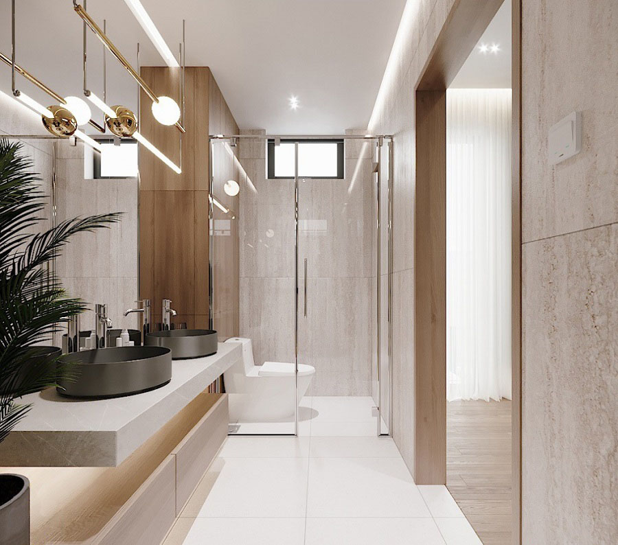 Phòng tắm, vệ sinh trong nhà ống 3 tầng được thiết kế với bồn rửa đôi và tách biệt hai khu khô - ướt, tạo sự thuận tiện cho sinh hoạt hàng ngày.