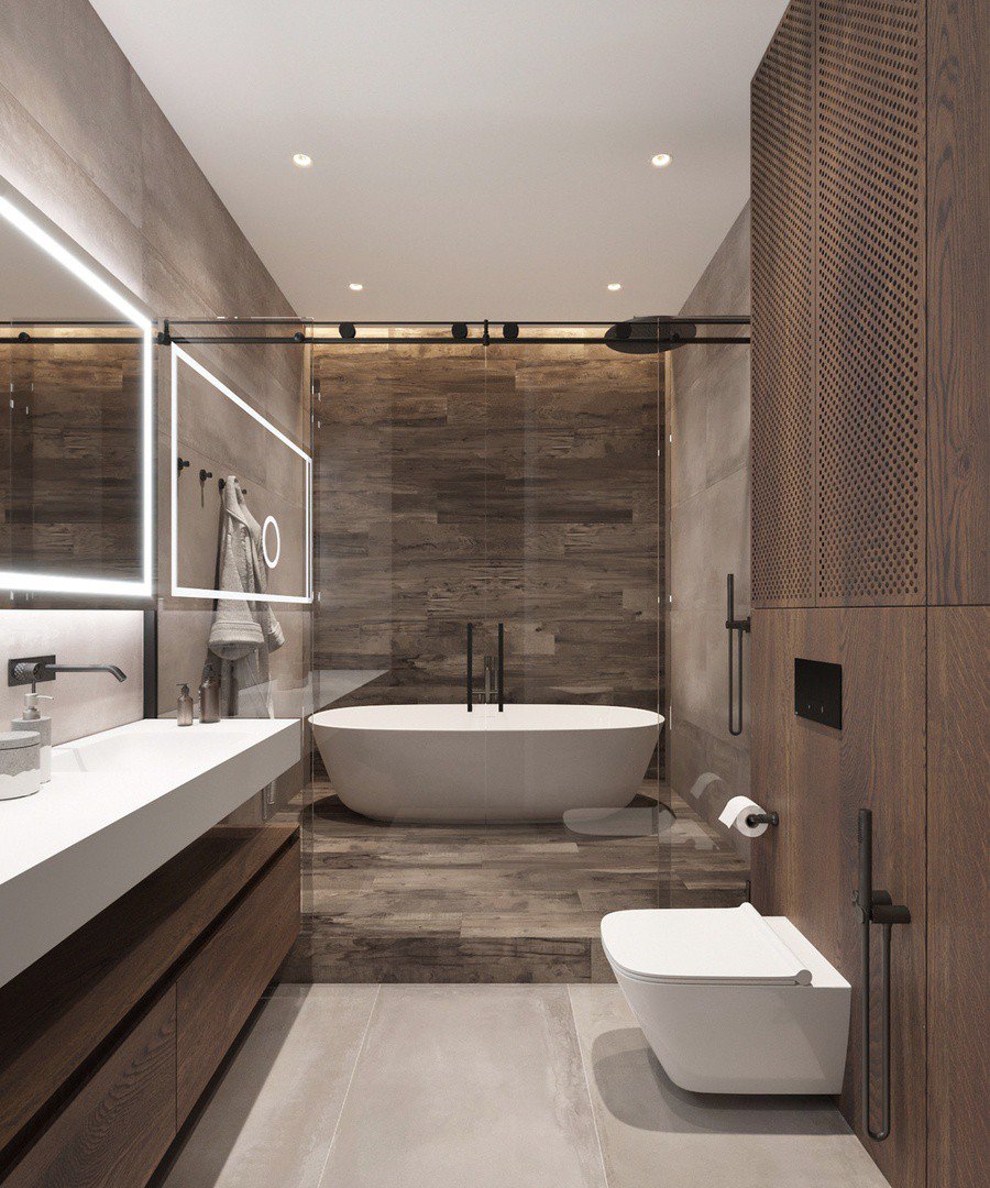 Phòng tắm trong nhà ống 4,5 tầng được thiết kế với tông màu trắng xám và nâu gỗ chủ đạo mang lại cảm giác thư giãn, dễ chịu.