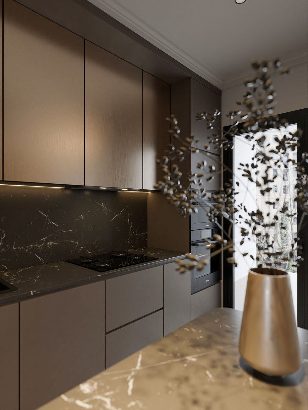 Không gian bếp được hoàn thiện với hệ tủ màu xám đen dạng cánh phẳng không tay nắm càng tôn thêm nét sang trọng cho căn phòng.