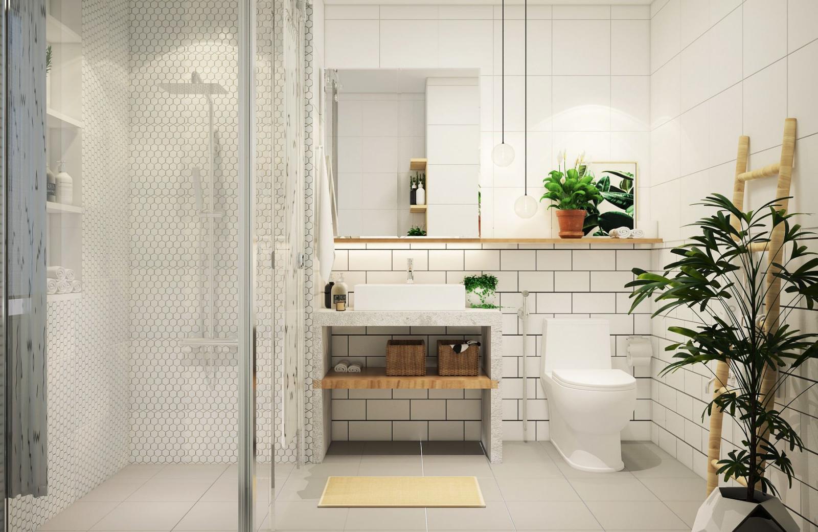 Phòng tắm và vệ sinh trong nhà ống 2,5 tầng được tách biệt rõ bởi vách kính cường lực trong suốt, tạo cảm giác rộng thoáng hơn so với thực tế.