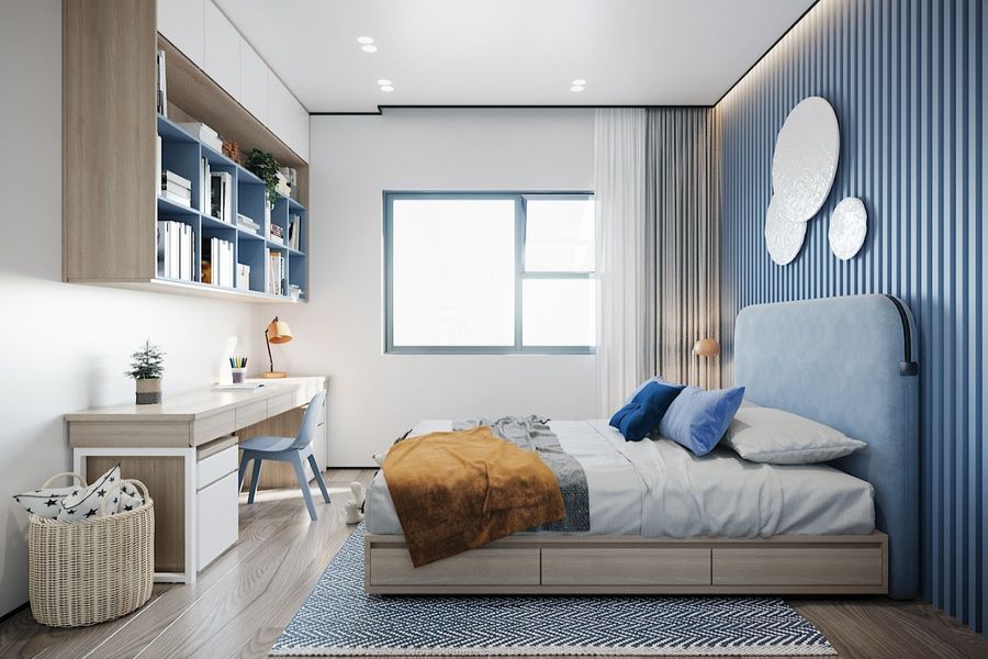 Phòng ngủ con trai phong cách hiện đại, trẻ trung với bảng màu xanh da trời tạo điểm nhấn dịu mát. Cửa sổ kính đón sáng tự nhiên cho toàn bộ căn phòng.