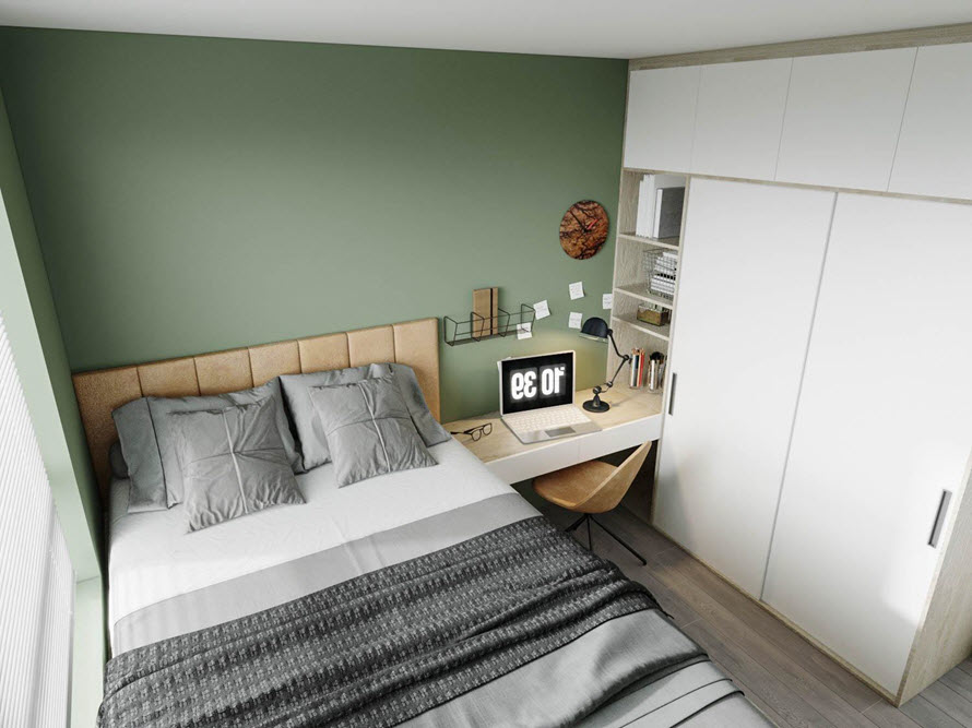 Phòng ngủ với sơn tường màu xanh lá nhẹ nhàng tạo cảm giác thư giãn