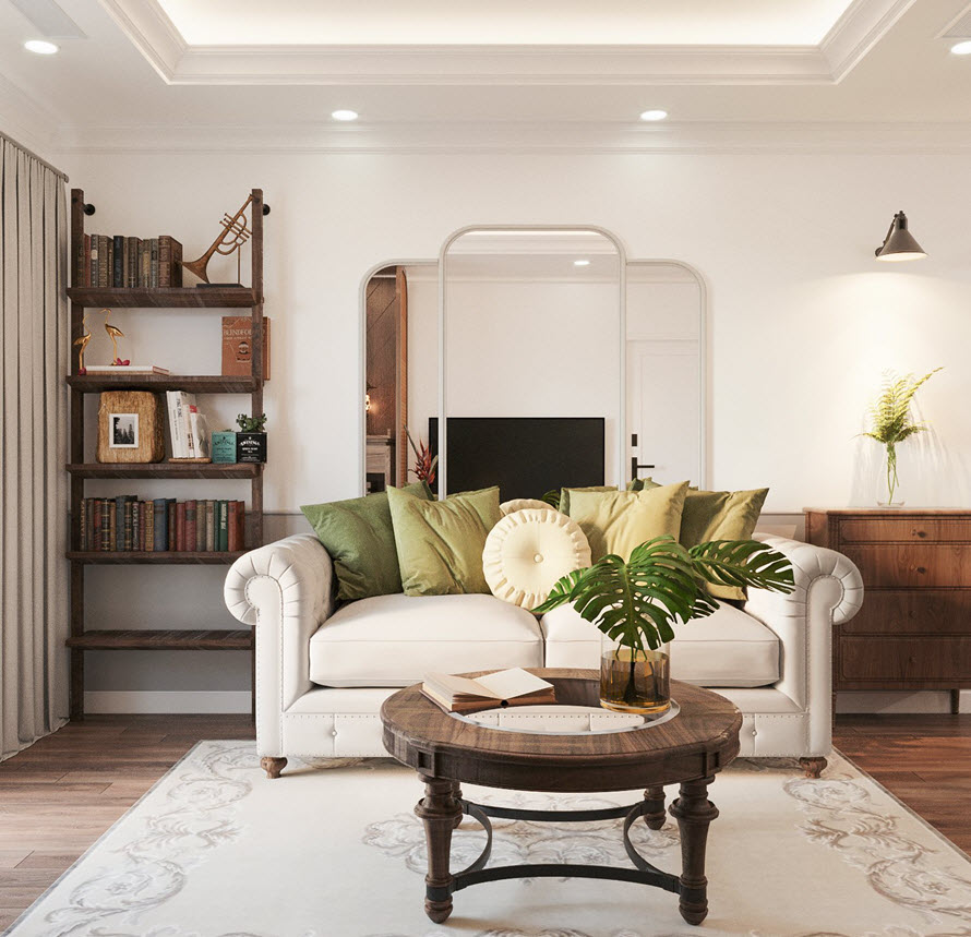 Phòng khách phong cách Đông Dương với ghế sofa đơn màu trắng sữa, gối tựa màu xanh lá, bàn tròn gỗ