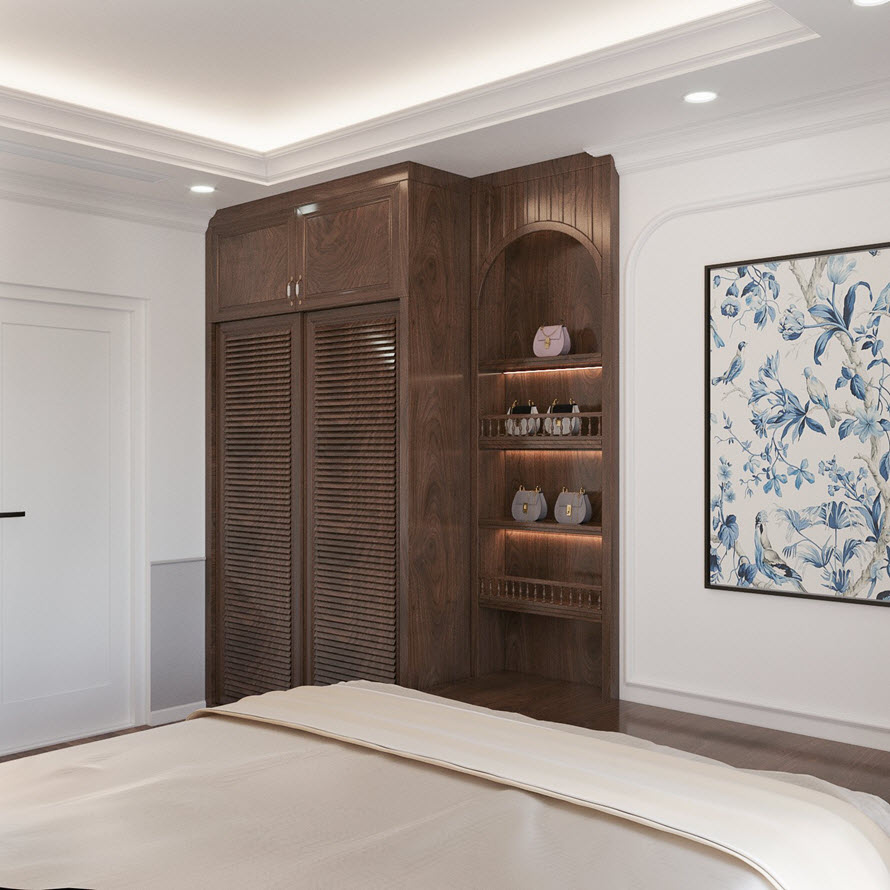 Tủ quần áo tích hợp kệ mở trang trí gọn xinh trong phòng ngủ. Tranh tường họa tiết Đông Dương trang nhã nhẹ nhàng tạo điểm nhấn.
