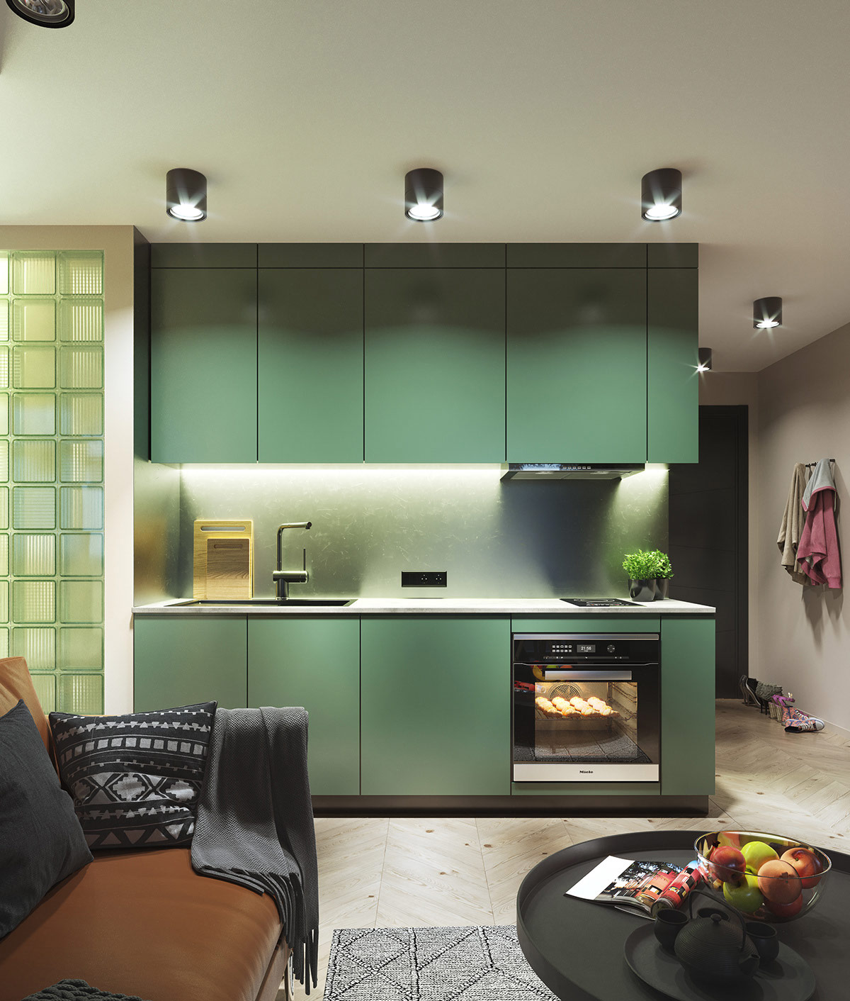 Bên cạnh nhà bếp màu xanh lá cây, gạch kính cùng tông màu tạo sự thống nhất, hài hòa cho tổng thể không gian sinh hoạt chung.