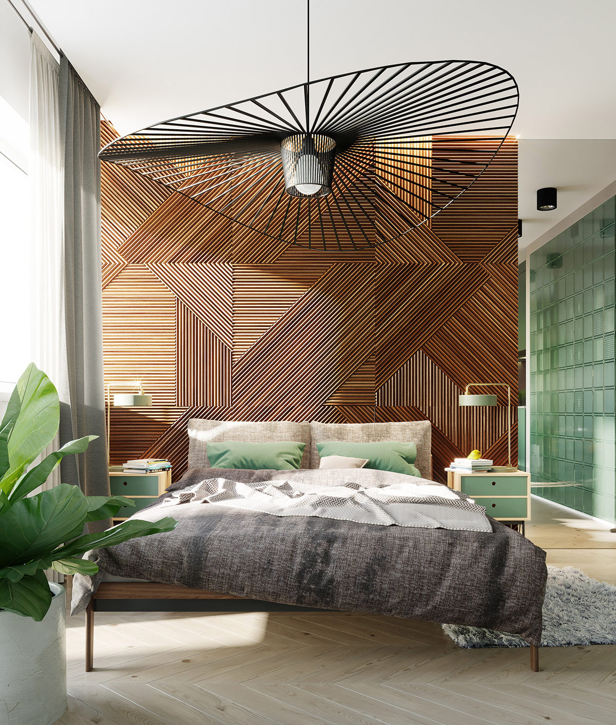 Phòng ngủ phong cách nhiệt đới kết hợp hiện đại với bức tường đầu giường ốp gỗ và những điểm nhấn màu xanh lá cây nổi bật. Những chiếc gối màu xanh lá làm sáng bộ chăn ga màu xám, trong khi đèn bàn đầu giường màu xanh lá cực bắt mắt.