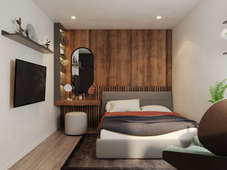 Phòng ngủ thứ nhất được thiết kế với bảng màu ấm áp, nổi bật là tường đầu giường ốp gỗ tạo cảm giác thư thái, thân thiện.