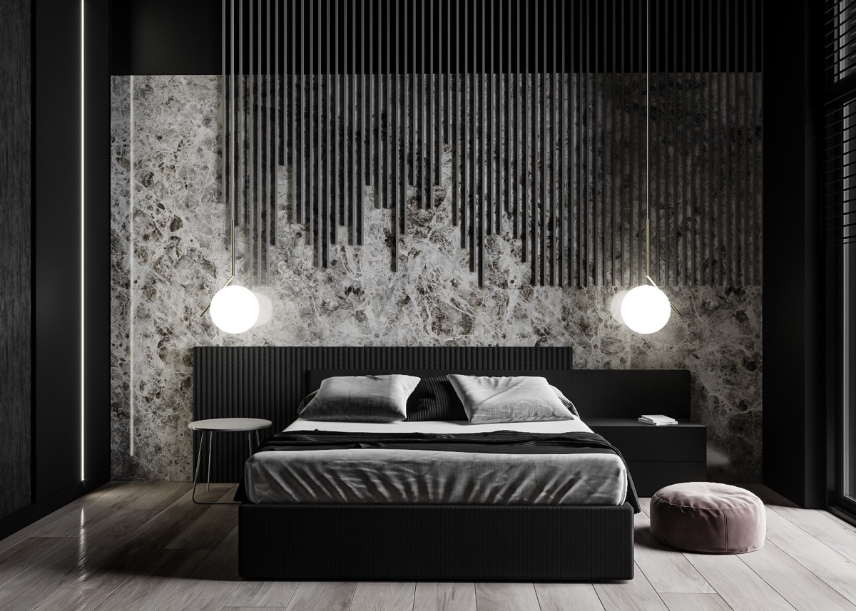 Mẫu phòng ngủ màu đen sang trọng, tinh tế và nhẹ nhàng hơn nhờ mảng tường đầu giường decor màu sáng hơn kết hợp cùng bộ đôi đèn thả mặt dây chuyền màu trắng.