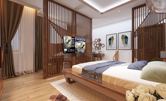 Phòng ngủ master khá rộng rãi, có thêm góc làm việc tại nhà được phân tách với khu nghỉ ngơi bằng lam gỗ thông thoáng.