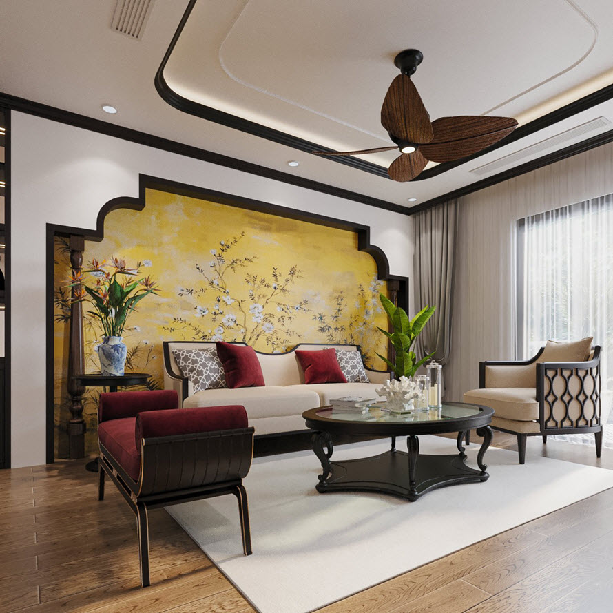 Trên phông nền màu đen - trắng và nâu gỗ chủ đạo của phòng khách, những điểm nhấn màu vàng, đỏ từ tranh tường và đệm ghế, gối tựa sofa trông thật nổi bật.
