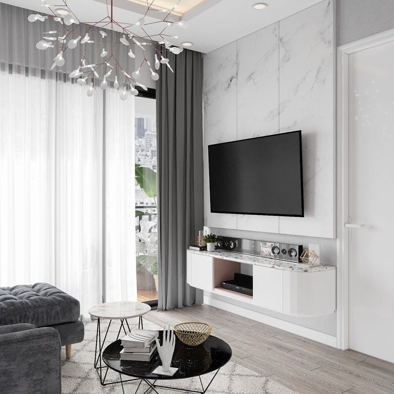 Phòng khách thiết kế hiện đại tối giản với tủ kệ tivi gắn tường gọn đẹp, tạo độ thông thoáng cho tổng thể không gian sinh hoạt chung.