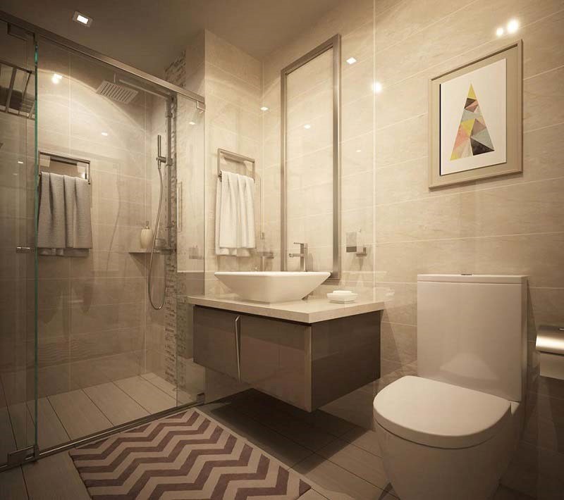 Mẫu phòng tắm - vệ sinh trong nhà ống 4 tầng 1 tum phong cách hiện đại. Buồng tắm kính tạo độ thoáng cho căn phòng.