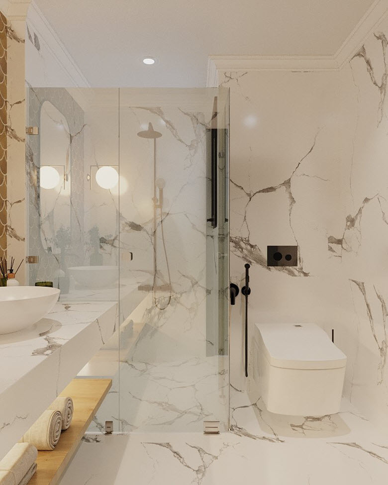 Phòng tắm nhà phố phong cách Đông Dương sang chảnh hơn với gạch đá cẩm thạch ốp lát tường và sàn.