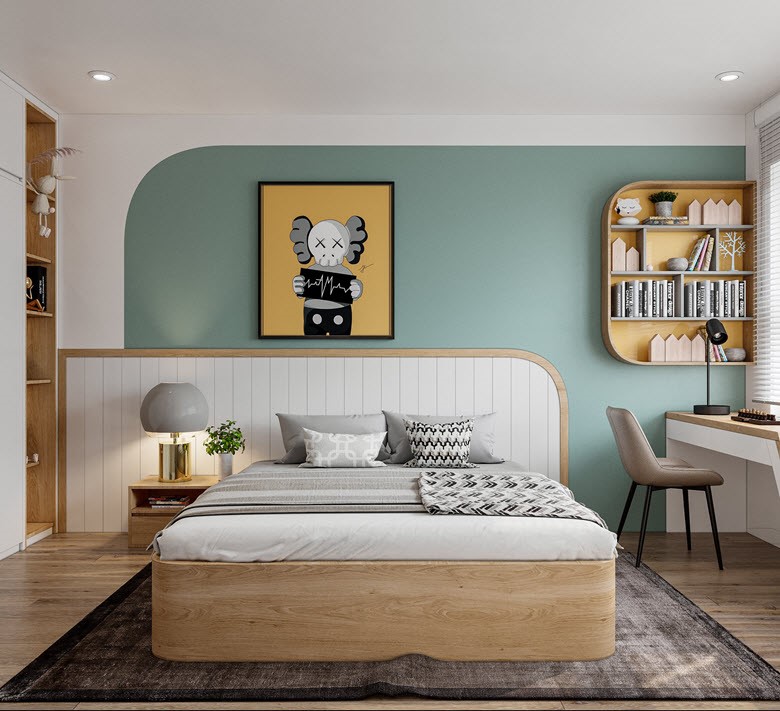 Đầu giường thẩm mĩ với vách nghệ thuật gắn trực tiếp vào tường. Bên trên là bức tranh sinh động. Một góc tường được sơn màu xanh tạo điểm nhấn.Tủ sách treo tường được bo góc tròn xinh yêu cộng với bàn học kết hợp ghế ngồi thư giãn.